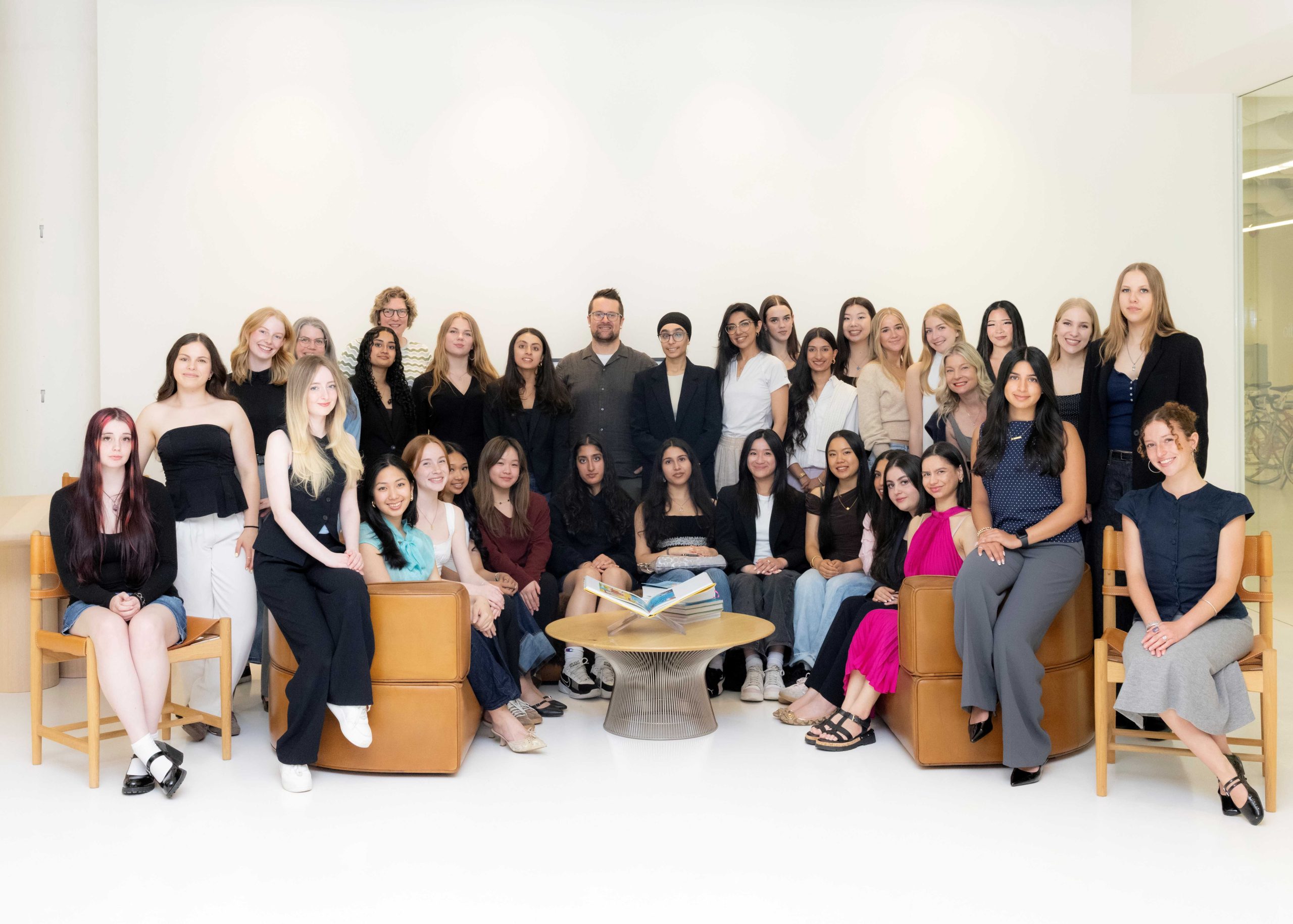 Group of 20 young women posing for a photo